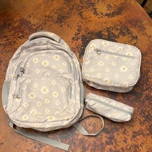 Gently used daisy backpack/ lunchbox/ pencil pouch set